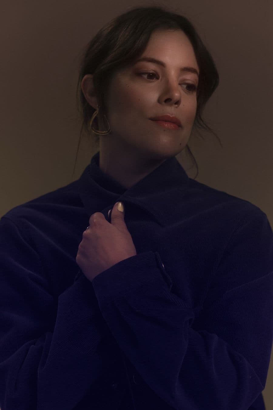 Portrait of Allie Warren Chinn in navy corduroy